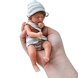[Mueca realista]: Bonita boca rosa, pestaas pintadas a mano, puntas de los dedos de las manos y de los pies pintadas a mano. Se ve muy realista, desde su rostro delicado hasta sus diminutos pies.