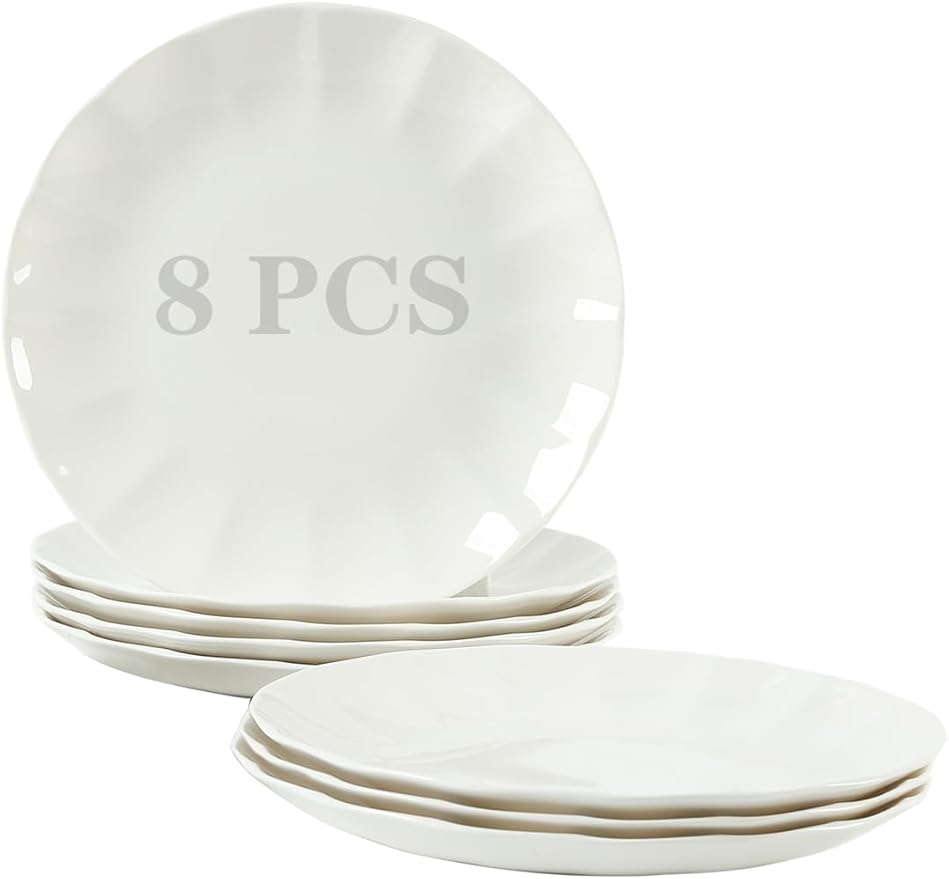 white shell shaped ceramic dinner plate