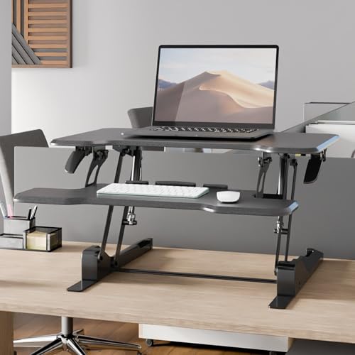 Image of Mount-It! Height Adjustable Standing Desk Converter, Compact 30 inch Wide Tabletop Standing Desk Riser with Gas Spring, Desktop Stand Up Workstation with Keyboard Tray Fits Monitor or Laptop, Black