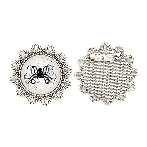 Broche de pulpo negro de plata y flor con acabados detallados