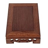 Décoration intérieure : votre espace de vie ou de travail en créant une harmonie entre fonctionnalité et style. présentoir en bois sculpté, vase présentoir