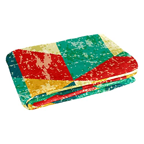 Couverture vintage triangles aux finitions soignées pour décoration de lit