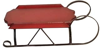 Decorative Antique Red sled on Wrought Iron Base. Made in The U.S.A.