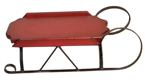 Decorative Antique Red sled on Wrought Iron Base. Made in The U.S.A.