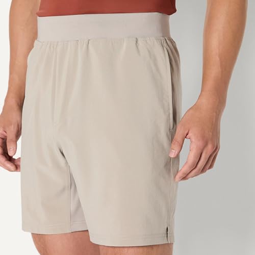 Image of Amazon Essentials Men's Athletic Running Training Shorts, Performance Stretch Woven Workout Shorts, 7 inch