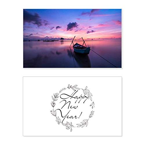 Tarjeta de Año Nuevo con paisaje marino y barco para felicitaciones con bendición