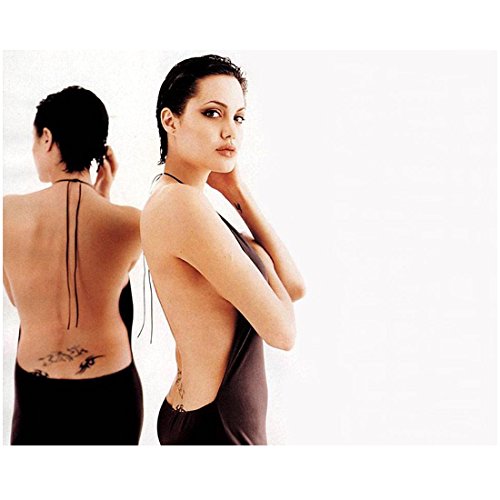 Angelina Jolie Short Hair Wearing Backless Dress Head Turned Arms Crossed  Hand on Hair Mirror Background 8 X 10 Inch Photo at Amazon's Entertainment  Collectibles Store
