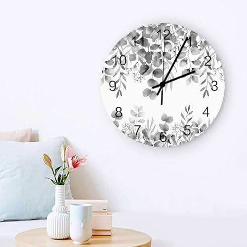 Grande horloge murale botanique au design eucalyptus raffiné