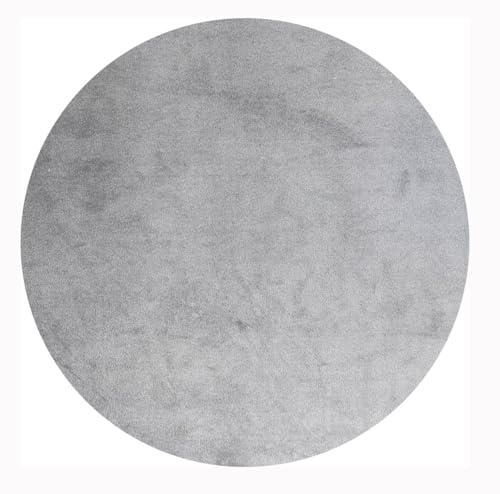 Tapis rond uni gris Tadi & Imperio2006 idéal pour réchauffer un petit salon