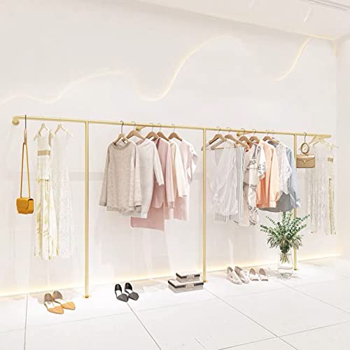 Tringle de magasin de vêtements dorée pour concept store chic