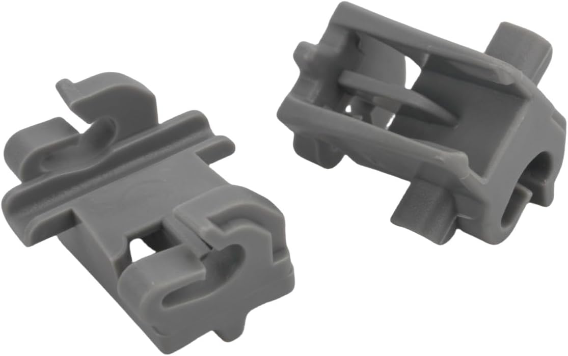 Close-up view of two gray dishwasher tine row clips