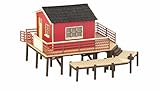 alquiler barcos Con el típico revestimiento de madera roja y las puertas y persianas blancas, este kit recuerda las vacaciones y aventuras pasadas