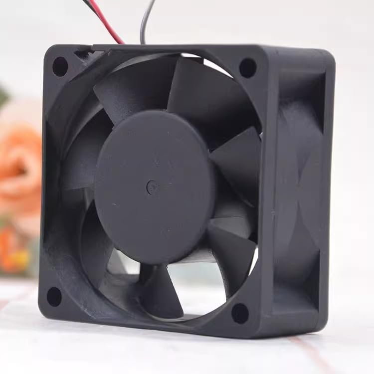 Rear view of the REAMTONY 6025 cooling fan, showing the fan blades and the mounting holes.