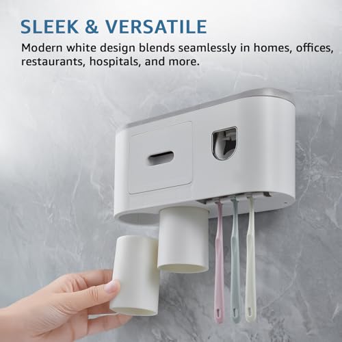 Image of Amazon Basics Toothpaste Dispenser and Toothbrush Holder | Wall-Mounted | 2 Magnetic Cups | Built-in Drawer | White | 27.3L x 10W x 21H cm