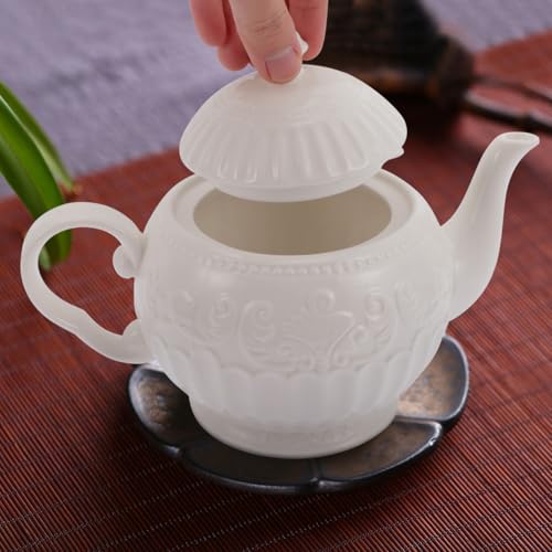 Tetera de cerámica decorativa Healeved con elegante relieve de hojas 6