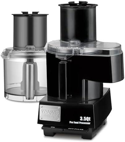 Black commercial food processor base with a sealed batch bowl and a continuous-feed chute attachment