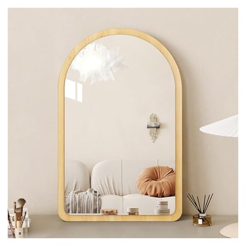 Miroir mural encadré en bois pour agrandir un salon sombre ou une petite entrée