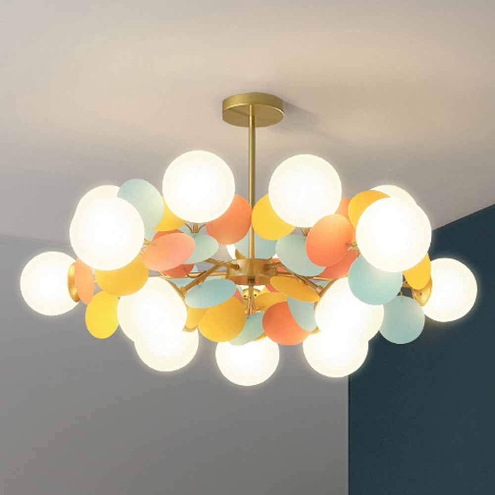 Suspension globe en verre dorée pour illuminer votre cuisine