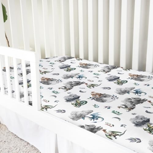 Image of Watercolor Dragons Fairytale Baby Crib Sheets - 52''x28'' Dragon Wings Leaves Moon Clouds Stretchy Fitted Mattress Cover for Boy & Girl - Soft Nursery Bed Sheets for Standard & Toddler Mattress