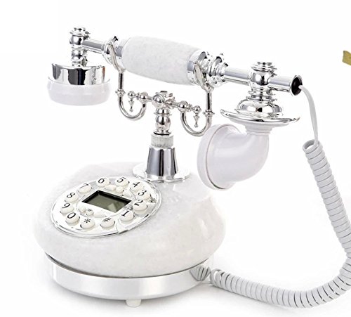 Téléphone antique fixe argenté contre les ondes des portables