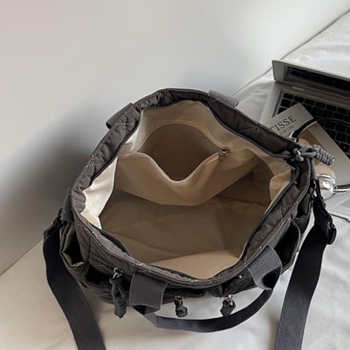 Sac à main matelassé avec poignée sur le dessus et rangements multiples