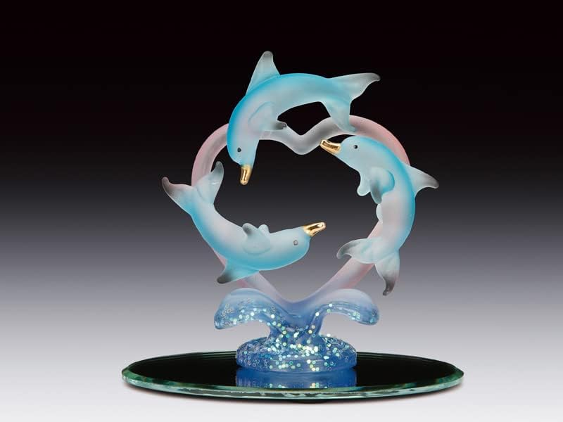 Corazón de cristal soplado de 3 delfines en base de espejo ovalado