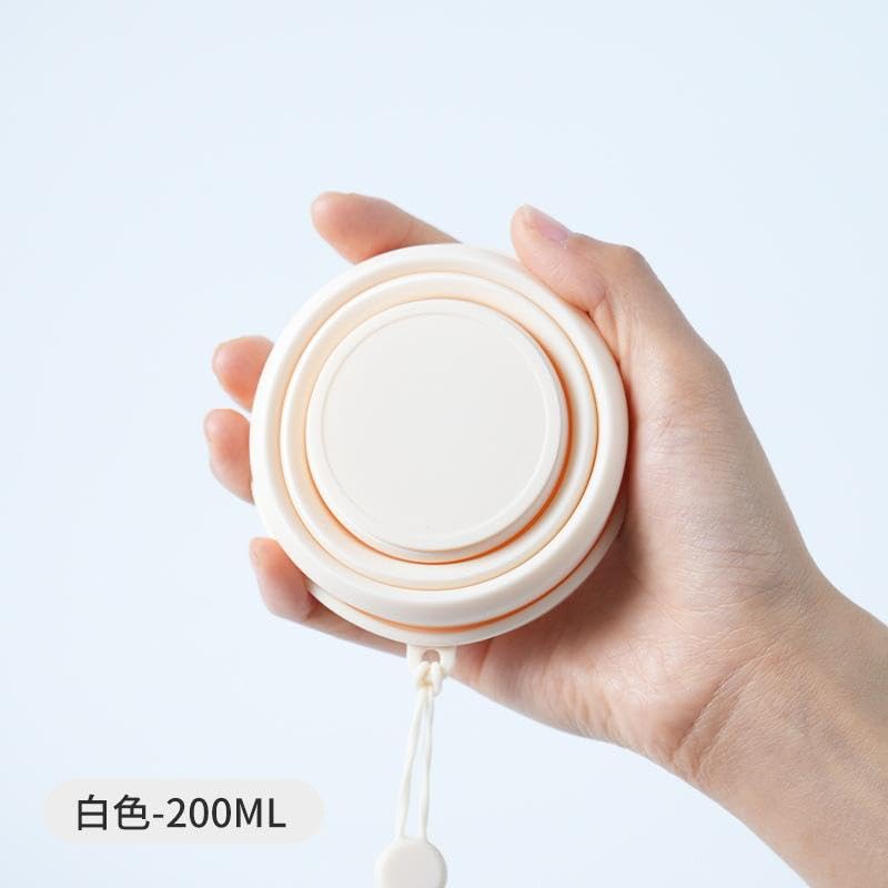 Image of 600ml Folding Silicone Water Bottle Sports Water Bottle Outdoor Travel Portable Water Bottle with Leak-Proof Lid Space-Saving Portable Bottle for Travel, Gym, Hiking, Camping (BEIG MUG)