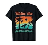 Riding perfect waves Surfing SUP at the Beach