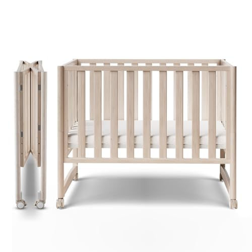 MAMAZING EvoNook 6-in-1 Convertible Mini Crib - Easy Assembly, Portable Folding Baby Mini Crib with Wheels, 100% New Zealand Wood, 4 Adjustable Mattress Heights, Washed Nature with Mattress