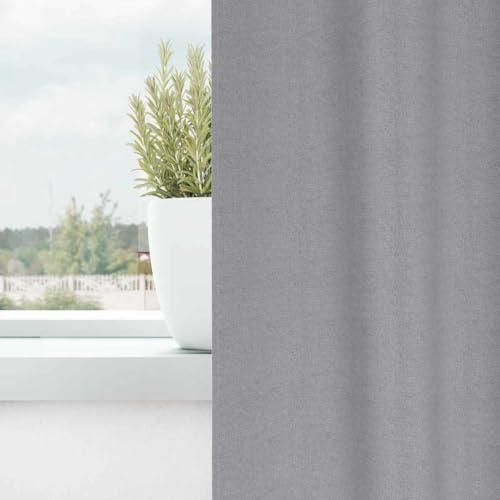 Rideaux occultants gris pour tamiser la chambre et créer une ambiance cocooning au salon