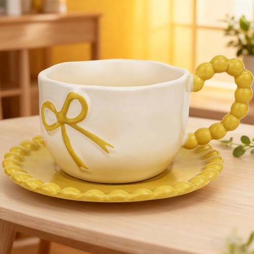 Taza de porcelana amarilla con moño 12 oz miniatura 1