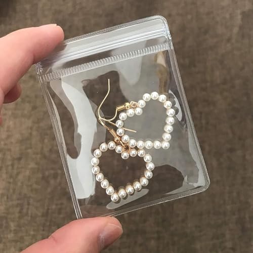 Image of 12Pcs PVC Jewelry Pouches Clear Zipper Bags Mini Transparent Plastic Portable Dustproof Bracelet Storage Bag Anti Oxidizing Earrings for Storage Jewelry Packing Bags (7x6 cm) (12 Pack)