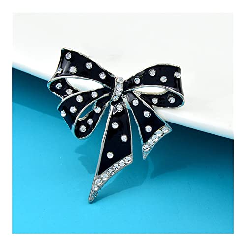 Broche en émail noir accessoire idéal pour tenue de fête