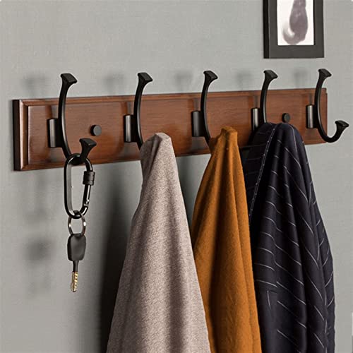 Chambre à coucher chaleureuse avec une patère en bois authentique - 3