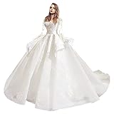 ABBELLIMENTI: pizzi intricati adornano l'abito e la gonna, perline, applicazioni per un look generoso ed elegante.