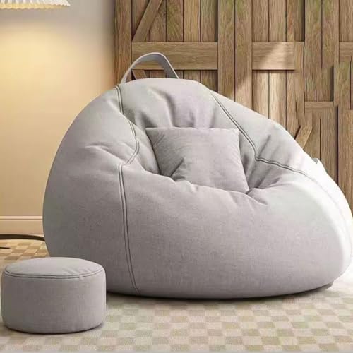 Puf relleno de espuma viscoelástica con reposapiés y funda de lino para comodidad en la sala de estar