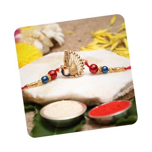 Image of eCraftIndia Red, Blue & Golden Designer Peacock Rakhi with Roli Chawal Pack - Rakhi for Brother