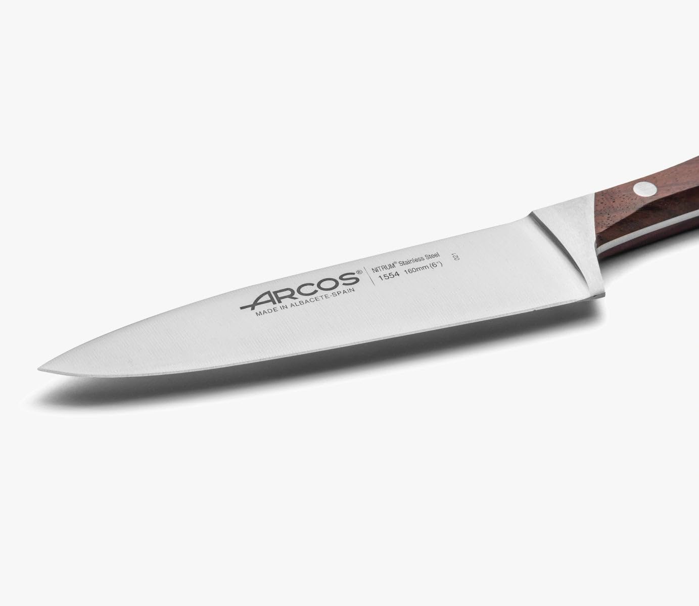 Arcos Forged Chef Knife 6 Inch. Nitrum Stainless Steel Blade 160 mm. Ergonomic Polyoxymethylene Handle. Rosewood Brown Handle. Rust & Wear Resistant. Natura Series