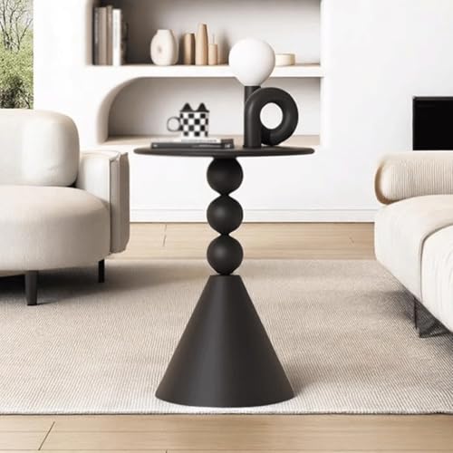 Table d'angle polyvalente ronde pour optimiser l'espace dans les studios et chambres