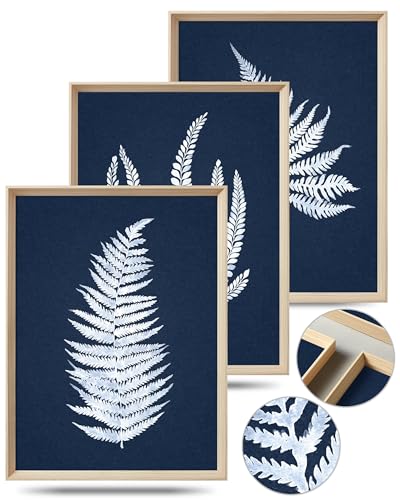 Feuilles blanches sur fond bleu : le triptyque idéal pour habiller un mur
