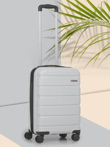 Image of TEAKWOOD LEATHERS Unisex Trolley Bag, Hard Side Cabin with Zipper Closure, Adjustable Push Button & Cross Strap, Lock System 360 Degree 8 Wheel Suitcase (S, Silver)