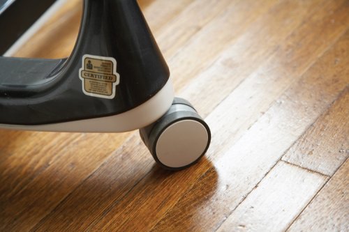Close-up of Peg Perego Prima Pappa Diner high chair wheel