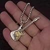 Best Electric Guitars Under $1,000: Top 5 Review and Picks 23 sundry goods Electric Guitar Pendant Necklace for women and men Gifts Couples necklace, silvery #1