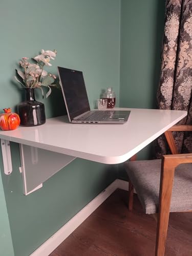 Table économiseur d'espace murale blanche : bureau d'étude rabattable et modulable