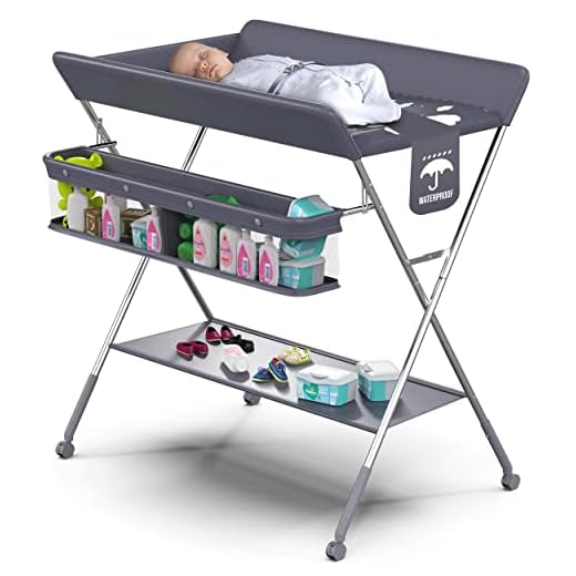 Babylicious Baby Portable Changing Table - Foldable Changing Table with Wheels - Portable Diaper Changing Station - Adjustable Height Baby Changing Table-Safety Belt and Large Storage Rack for Infants