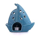 ⛵️ Unsere Figur für die Wohnung lässt sich mit einer Kerze bestücken. Kombinieren Sie unsere Figuren Fisch in grün, Seestern in weiß und Segelboot in türkis-blau mit Muscheln und anderen Dekofiguren.