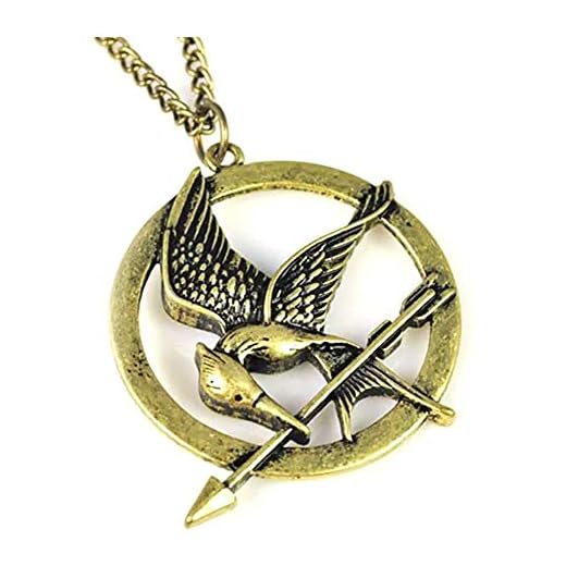 Broches inspirados en la película de Los Juegos del Hambre en llamas de Sinsajo, disfraz imprescindible de H&H UK, Metal