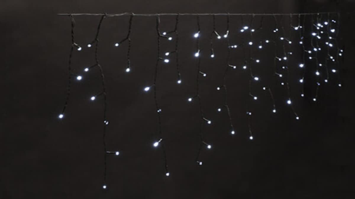Cortina brillante exterior para iluminar tu jardín en Navidad con 450 luces LED blanco frío