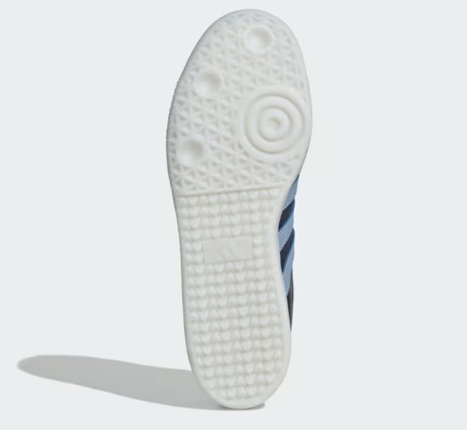 adidas SHANAV/AMBSKY/Goldmt Men's Samba AFA Shadow navyAmbient Sky/Gold met. 5 US, 5 Wide3