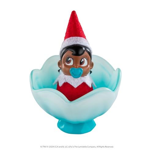 Image of The Elf on the Shelf Frost Pips Mini Blooms Elf Baby Girl with Brown Eyes | Includes a Frost Pips Elf Baby with brown eyes and Frost Flower Cradle.